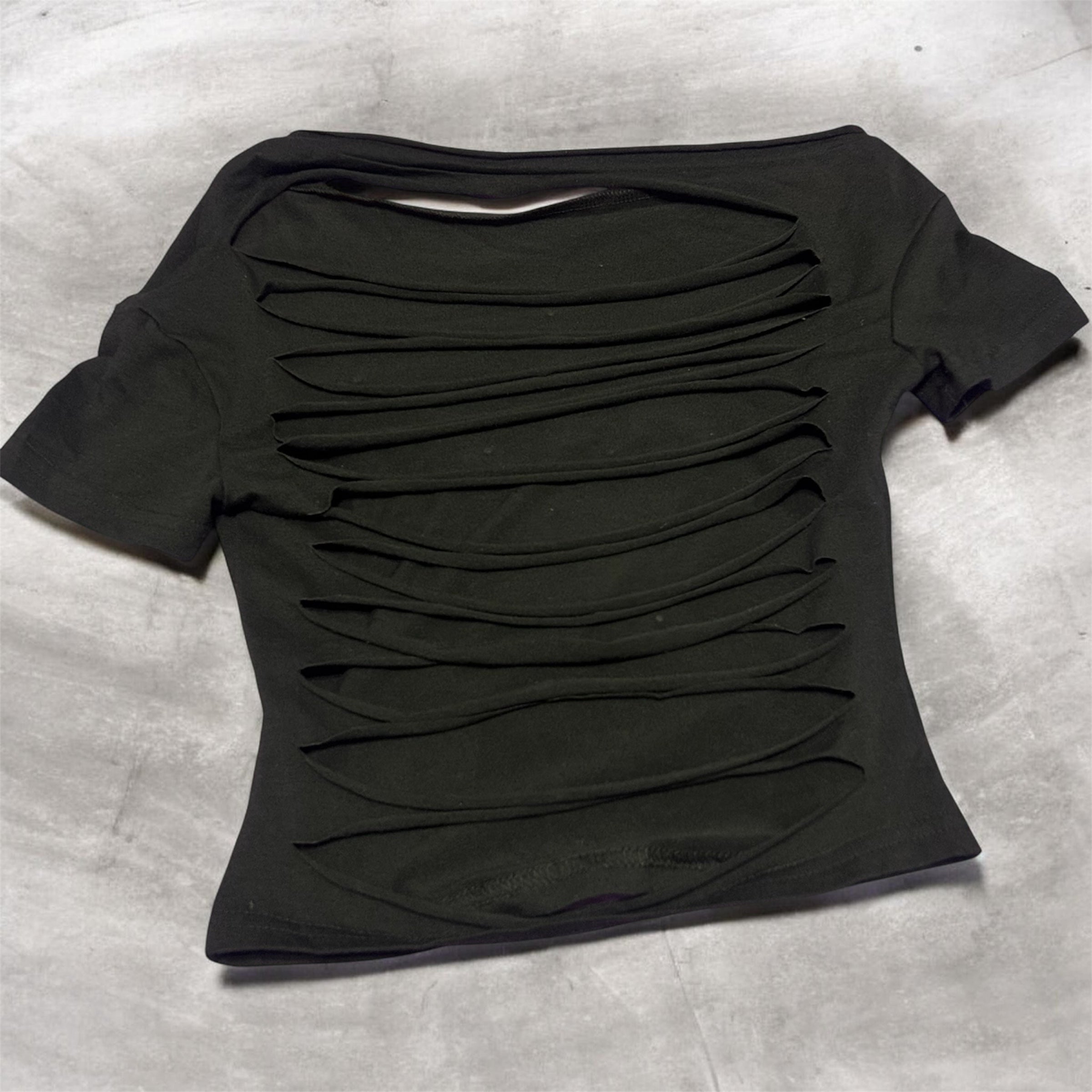 Black shirt with bow designs and small rhinestones